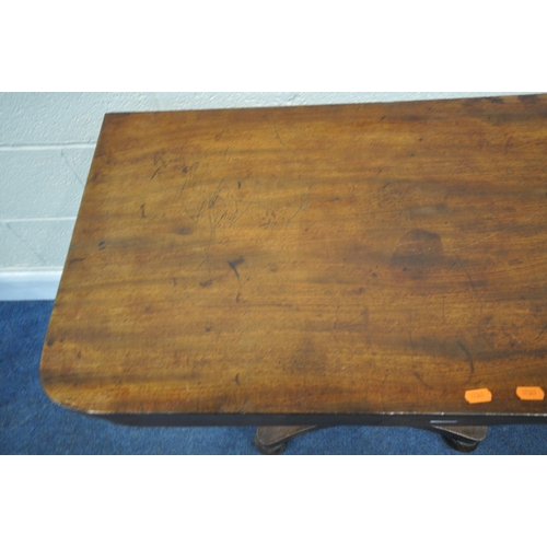 155 - A REGENCY MAHOGANY FOLD OVER CARD TABLE, with a swivel top and storage section, the top enclosing a ... 