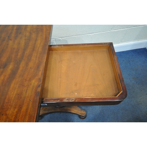 155 - A REGENCY MAHOGANY FOLD OVER CARD TABLE, with a swivel top and storage section, the top enclosing a ... 