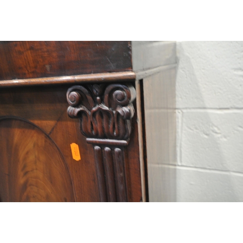 160 - A REGENCY MAHOGANY POT CUPBOARD, with raised gallery back and sides, the single cupboard door with p... 