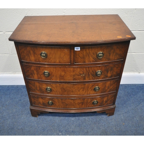 161 - A REPRODUCTION WALNUT AND MAHOGANY BOW FRONT CHEST OF TWO SHORT OVER THREE LONG DRAWERS, raised on c... 