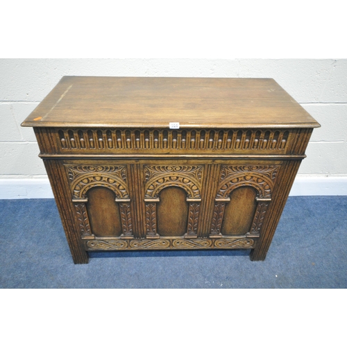 164 - A 20TH CENTURY OAK BLANKET CHEST, with repeating patterns, width 100cm x depth 48cm x height 77cm, c... 