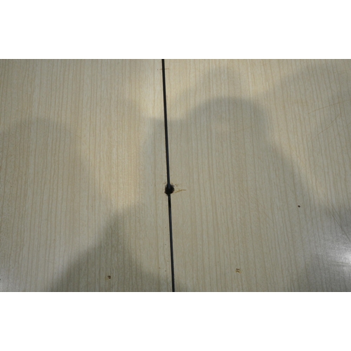 183 - A SCANDINAVIAN STYLE FORMICA TOP FOLD OVER TABLE, the top swivels revealing a storage section, raise... 