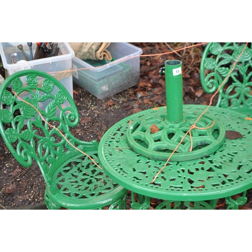 15 - A CAST ALUMINIUM ROUND GARDEN TABLE, a pair of chairs and a parasol base, table diameter 60cm (4)