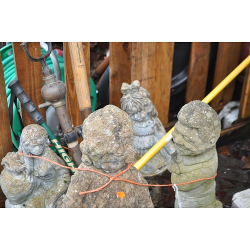 3 - THREE MODERN COMPOSITE GARDEN FIGURES, a plastic figure and garden tools, tallest figure being 60cm ... 