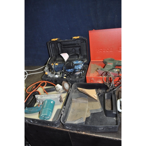 58 - A COLLECTION OF POWER TOOLS including a Titan router, a Performance Pro biscuit jointer, a Champion ... 