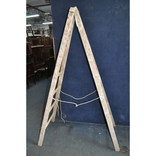 68 - A VINTAGE WOODEN SET OF DECORATORS STEP LADDERS with 6 rungs to each 200cm section