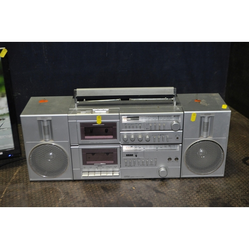 73 - A BLAUPUNKT 24in TV/DVD with non working remote (PAT pass and working) and an Amstrad Model 8090 hi ... 