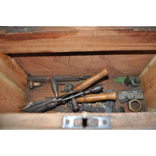 74 - AN EARLY 20th CENTURY PINE TOOLCHEST with sliding and lift away inserts containing tools width 97cm,... 