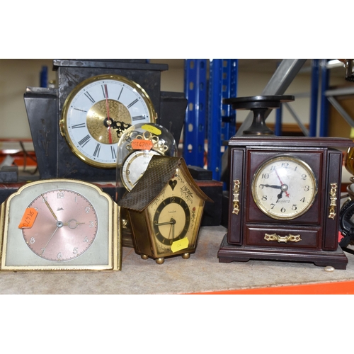 854 - A GROUP OF NINE ASSORTED VINTAGE CLOCKS to include a Juba table clock with a metallic rose face (doe... 