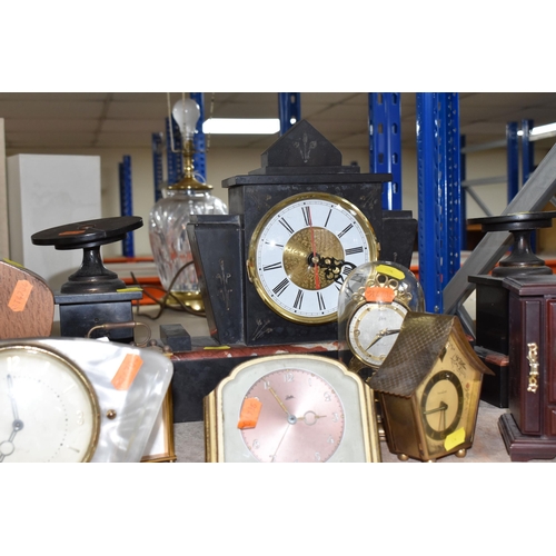 854 - A GROUP OF NINE ASSORTED VINTAGE CLOCKS to include a Juba table clock with a metallic rose face (doe... 