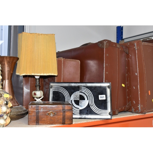 861 - A GROUP OF VINTAGE SUITCASES AND DECORATIVE ITEMS to include four brown leather suitcases of various... 