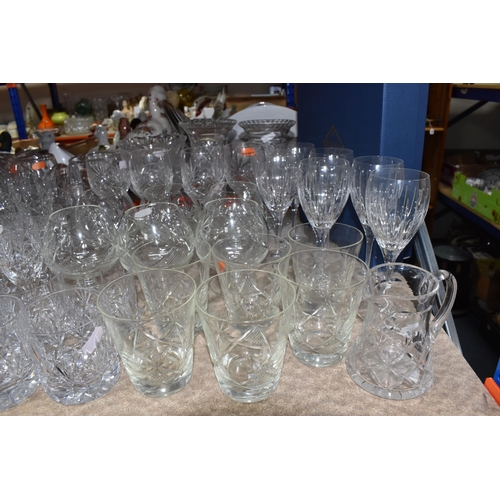 884 - A QUANTITY OF CUT CRYSTAL AND SIMILAR GLASSWARE, over sixty pieces to include nine sets/part sets of... 