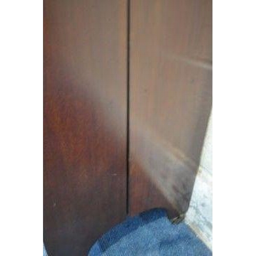 149 - AN EDWARDIAN MAHOGANY PURDONIUM, with a raised back, the fall front door enclosing a metal insert, r... 