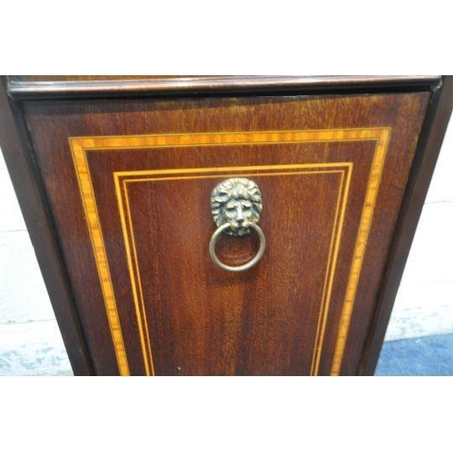 149 - AN EDWARDIAN MAHOGANY PURDONIUM, with a raised back, the fall front door enclosing a metal insert, r... 