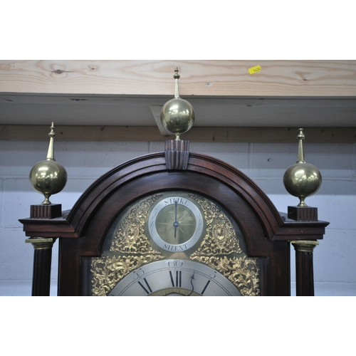 156 - A GEORGIAN MAHOGANY LONGCASE CLOCK, the arched hood with three brass finials, the arched glass door ... 