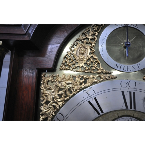 156 - A GEORGIAN MAHOGANY LONGCASE CLOCK, the arched hood with three brass finials, the arched glass door ... 