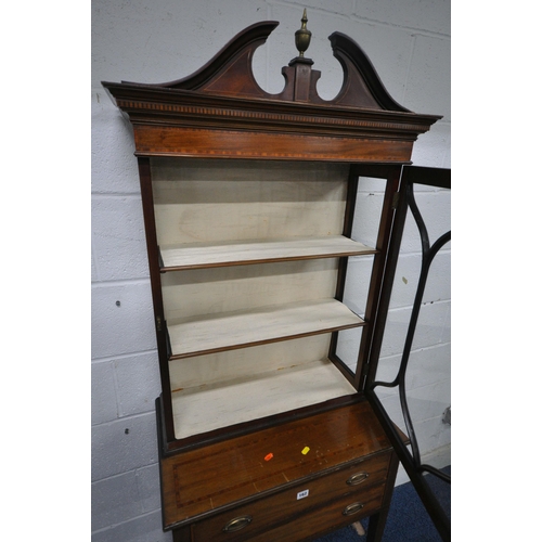 162 - AN EDWARDIAN MAHOGANY DISPLAY CABINET ON STAND, with a broken arch pediment, a brass finial, the gla... 