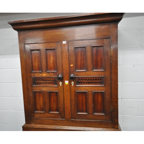 166 - AN 18TH CENTURY WELSH OAK CWPWRDD BARA CAWS, BREAD AND CHEESE CUPBOARD, the double cupboard doors wi... 