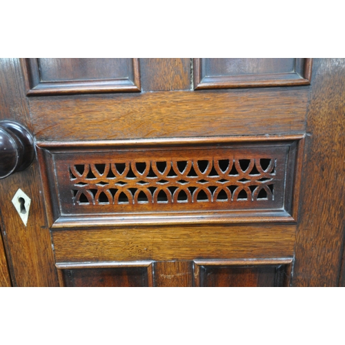 166 - AN 18TH CENTURY WELSH OAK CWPWRDD BARA CAWS, BREAD AND CHEESE CUPBOARD, the double cupboard doors wi... 