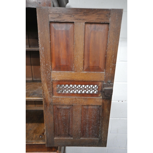 166 - AN 18TH CENTURY WELSH OAK CWPWRDD BARA CAWS, BREAD AND CHEESE CUPBOARD, the double cupboard doors wi... 