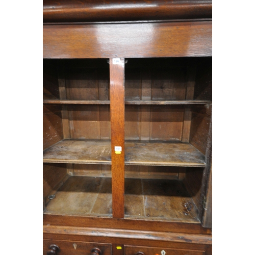 166 - AN 18TH CENTURY WELSH OAK CWPWRDD BARA CAWS, BREAD AND CHEESE CUPBOARD, the double cupboard doors wi... 