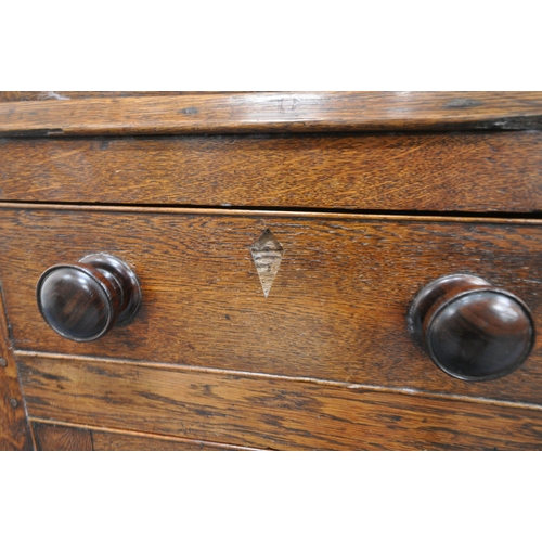 166 - AN 18TH CENTURY WELSH OAK CWPWRDD BARA CAWS, BREAD AND CHEESE CUPBOARD, the double cupboard doors wi... 