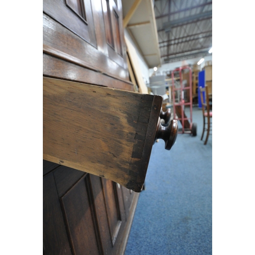 166 - AN 18TH CENTURY WELSH OAK CWPWRDD BARA CAWS, BREAD AND CHEESE CUPBOARD, the double cupboard doors wi... 