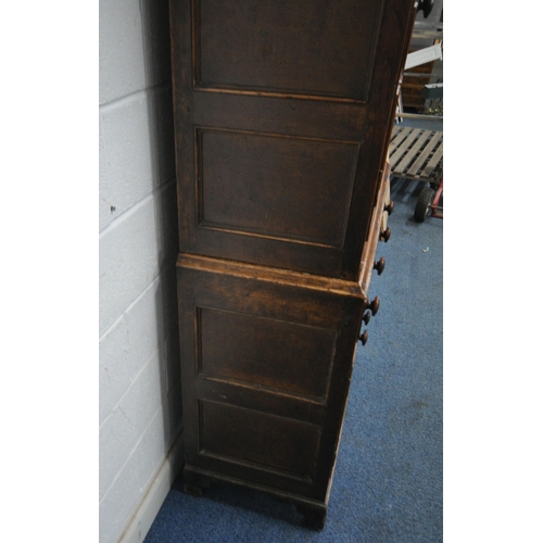 166 - AN 18TH CENTURY WELSH OAK CWPWRDD BARA CAWS, BREAD AND CHEESE CUPBOARD, the double cupboard doors wi... 