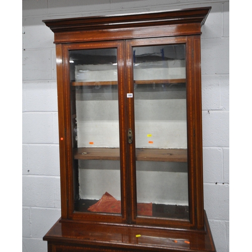 167 - AN EDWARDIAN MAHOGANY BOOKCASE, with double glazed doors, atop a base with a single drawer, above do... 