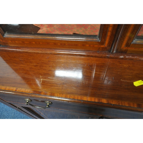 167 - AN EDWARDIAN MAHOGANY BOOKCASE, with double glazed doors, atop a base with a single drawer, above do... 