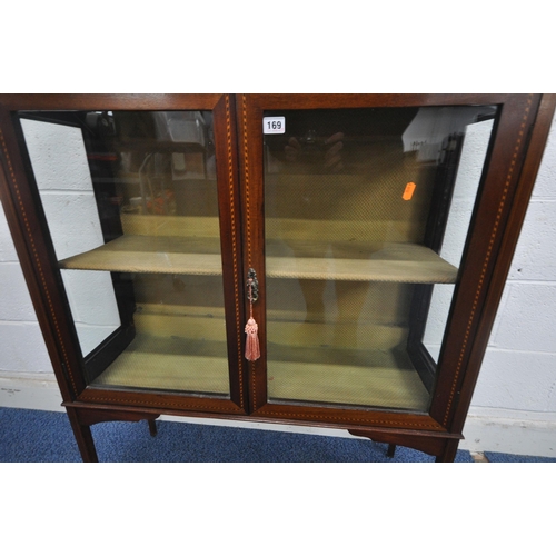 169 - AN EDWARDIAN MAHOGANY DISPLAY CABINET, with double doors, raised on square tapered legs, width 92cm ... 