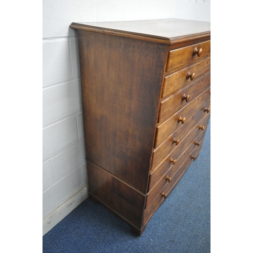 176 - A GEORGIAN OAK CHEST OF TWO SHORT OVER SEVEN GRADUATED DRAWERS, raised on bracket feet, width 123cm ... 