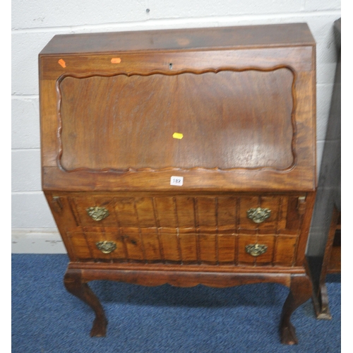 182 - A LATE 20TH CENTURY HARDWOOD BUREAU, the fall front door enclosing a fitted interior, above two draw... 