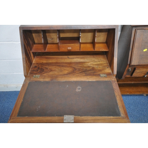 182 - A LATE 20TH CENTURY HARDWOOD BUREAU, the fall front door enclosing a fitted interior, above two draw... 