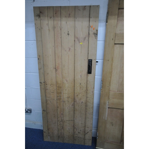 186 - THREE MATCHING PINE DOORS, 76cm x 196cm, along with another pine door, condition report: all with ma... 