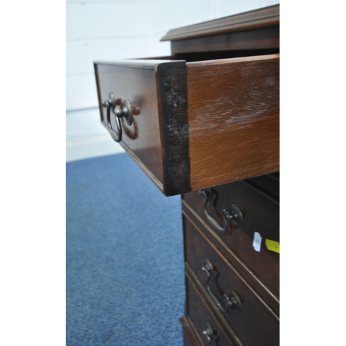 187 - A 20TH CENTURY MAHOGANY TWIN PEDESTAL DESK, with a green leather writing surface, fitted with nine a... 