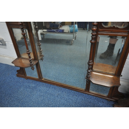 188 - TWO 20TH CENTURY MAHOGANY OVERMANTEL MIRRORS, both with finials, turned supports, bevelled mirror pl... 