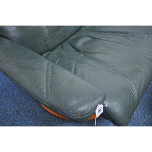 191 - AN EKORNES STRESSLESS GREEN LEATHERETTE RECLINING ARMCHAIR, width 86cm x depth 80cm x height 100cm, ... 