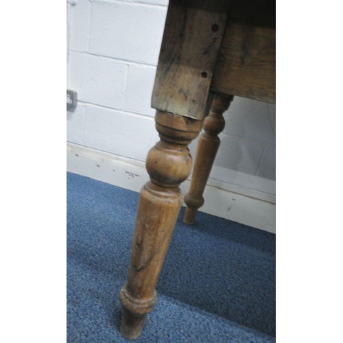 193 - A 19TH CENTURY PINE FARMHOUSE STYLE TABLE, raised on turned and tapered legs, length 182cm x depth 8... 