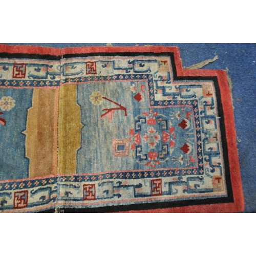 199 - A TIBETAN RECTANGULAR RUG, depicting two dragons, black field, and a multi-coloured border, 139cm x ... 