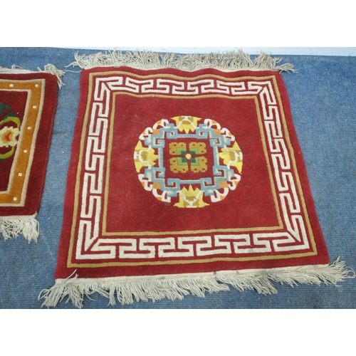 199 - A TIBETAN RECTANGULAR RUG, depicting two dragons, black field, and a multi-coloured border, 139cm x ... 