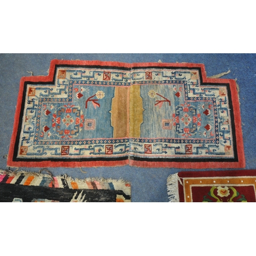 199 - A TIBETAN RECTANGULAR RUG, depicting two dragons, black field, and a multi-coloured border, 139cm x ... 