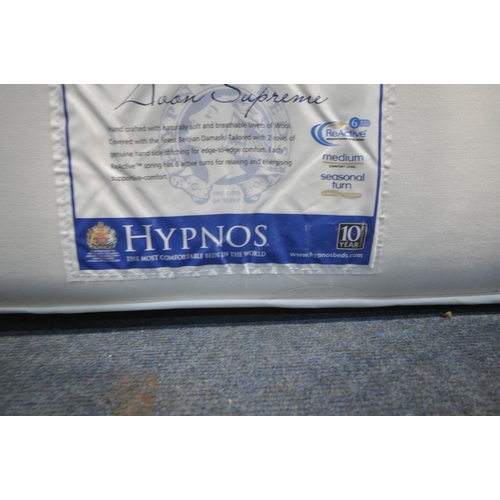 206 - A HYPNOS BED SINGLE MATTRESS, with a folding base, condition report: general signs of usage