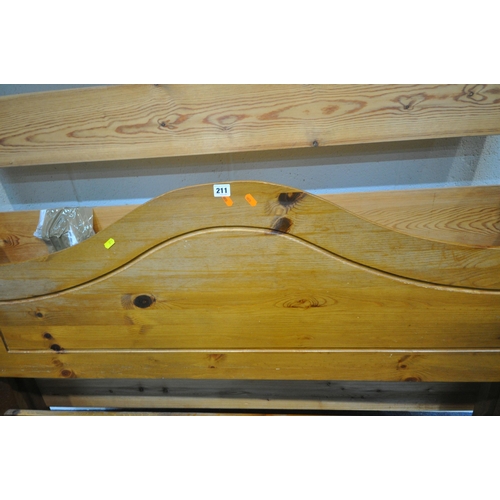 211 - A MODERN PINE 4FT6 BEDSTEAD, with side rails, slats and bolts, condition report: marks, scuffs, disc... 