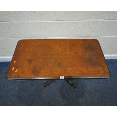 213 - AN EDWARDIAN OAK FOLD OVER CARD / GAMES TABLE, the swivel top opens to reveal a green baize playing ... 