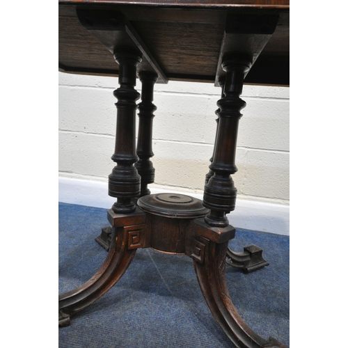 213 - AN EDWARDIAN OAK FOLD OVER CARD / GAMES TABLE, the swivel top opens to reveal a green baize playing ... 