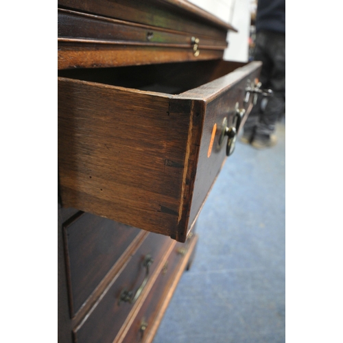 217 - A GEORGIAN MAHOGANY CHEST OF FOUR GRADUATED DRAWERS, with a brushing slide, raised on bracket feet, ... 