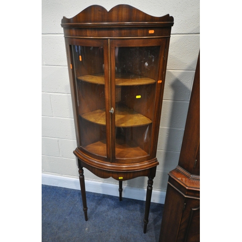 222 - A LATE 20TH CENTURY MAHOGANY CORNER CUPBOARD, fitted with double glazed doors, above double cupboard... 