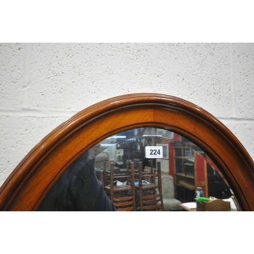 224 - A MAHOGANY FRAMED OVAL BEVELLED EDGE WALL MIRROR, 88cm x 63cm, a coffee table, a musical table, and ... 