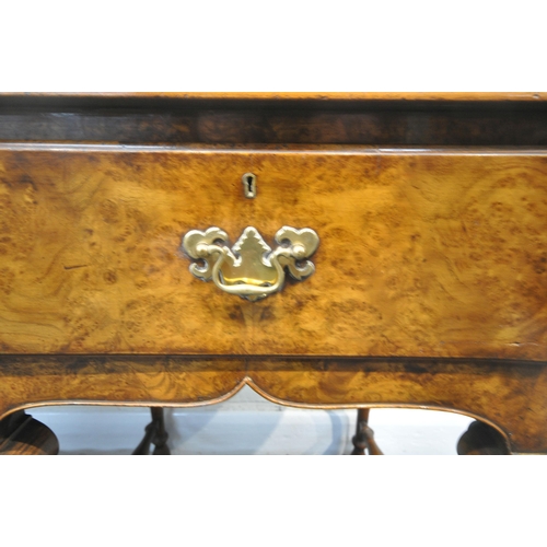 244 - A QUEEN ANNE STYLE BURR ELM DRESSER BASE, fitted with three drawers, raised on front cabriole legs, ... 